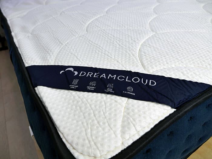 DreamCloud Luxury Hybrid strap logo